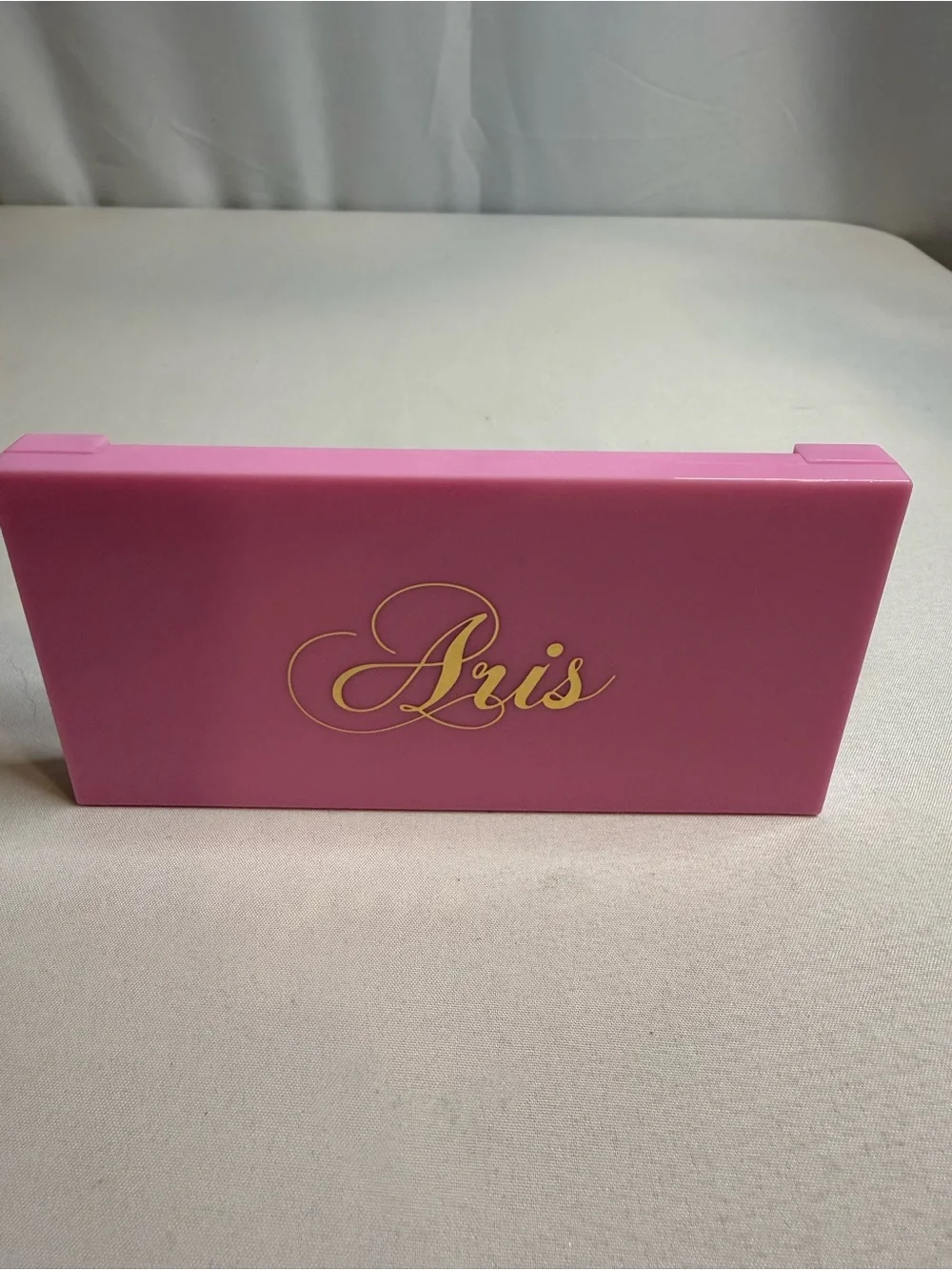 Aris Glossy Pink Palette with Gold Script Logo